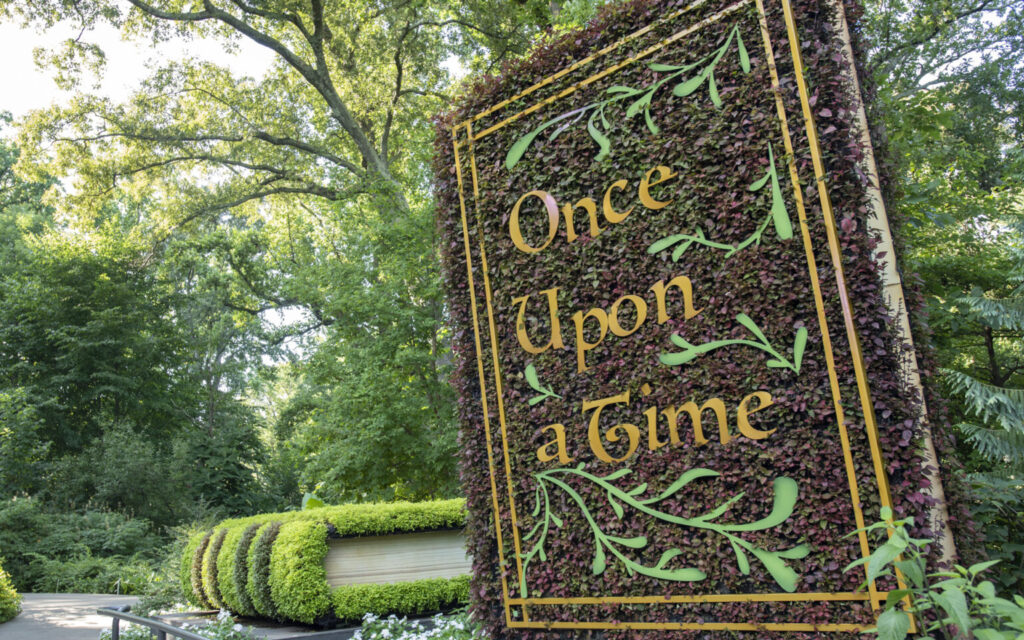 Once Upon a Time book covered in ivy at the San Antonio Botanical Gardens